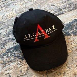 Black Alcatraz Cap with Red Lettering